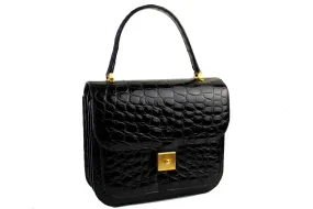 Jet black crocodile skin handbag with flap and decorative clasp