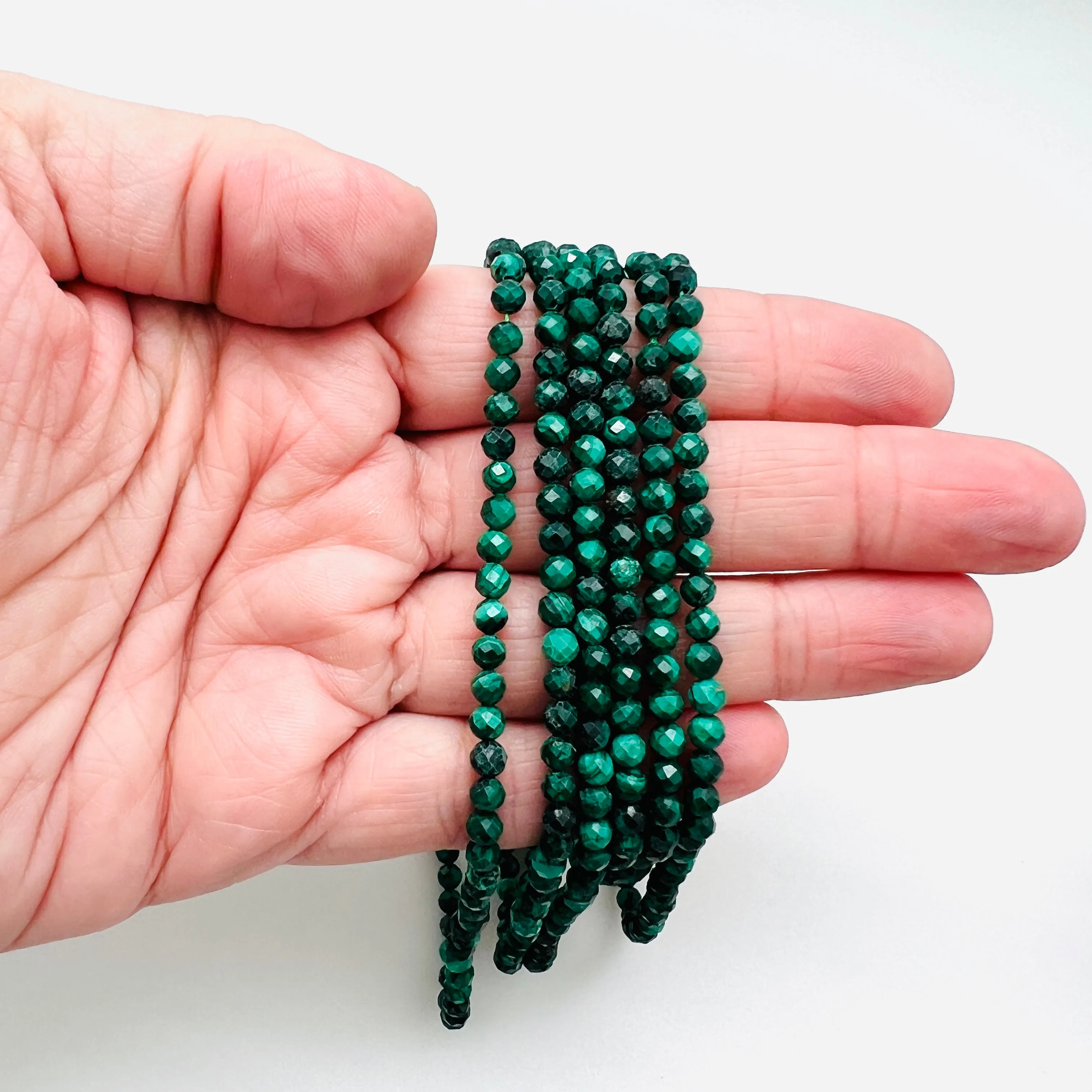 Malachite Faceted Rounds - 4mm