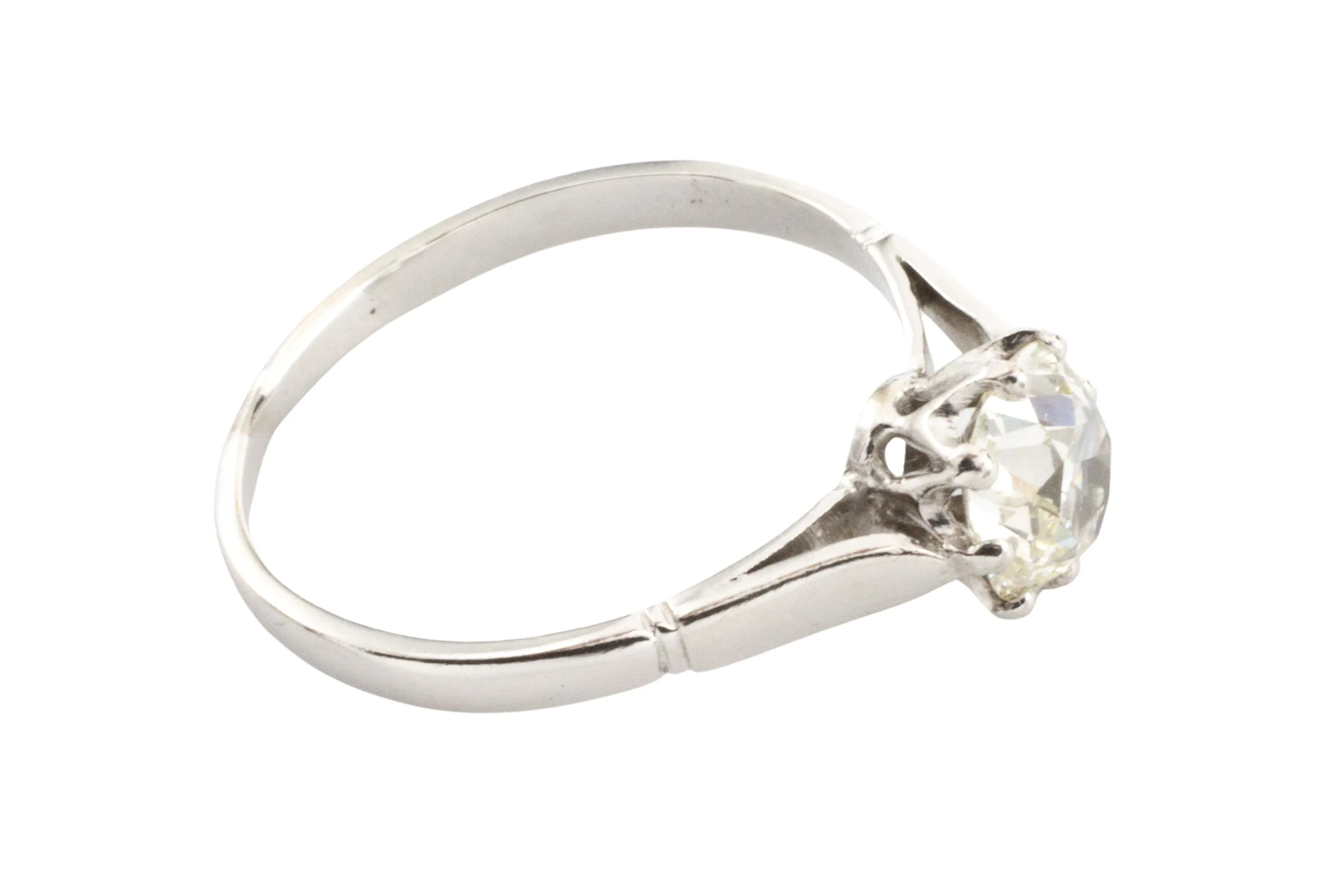 Old cut diamond solitaire in 14 carat white gold