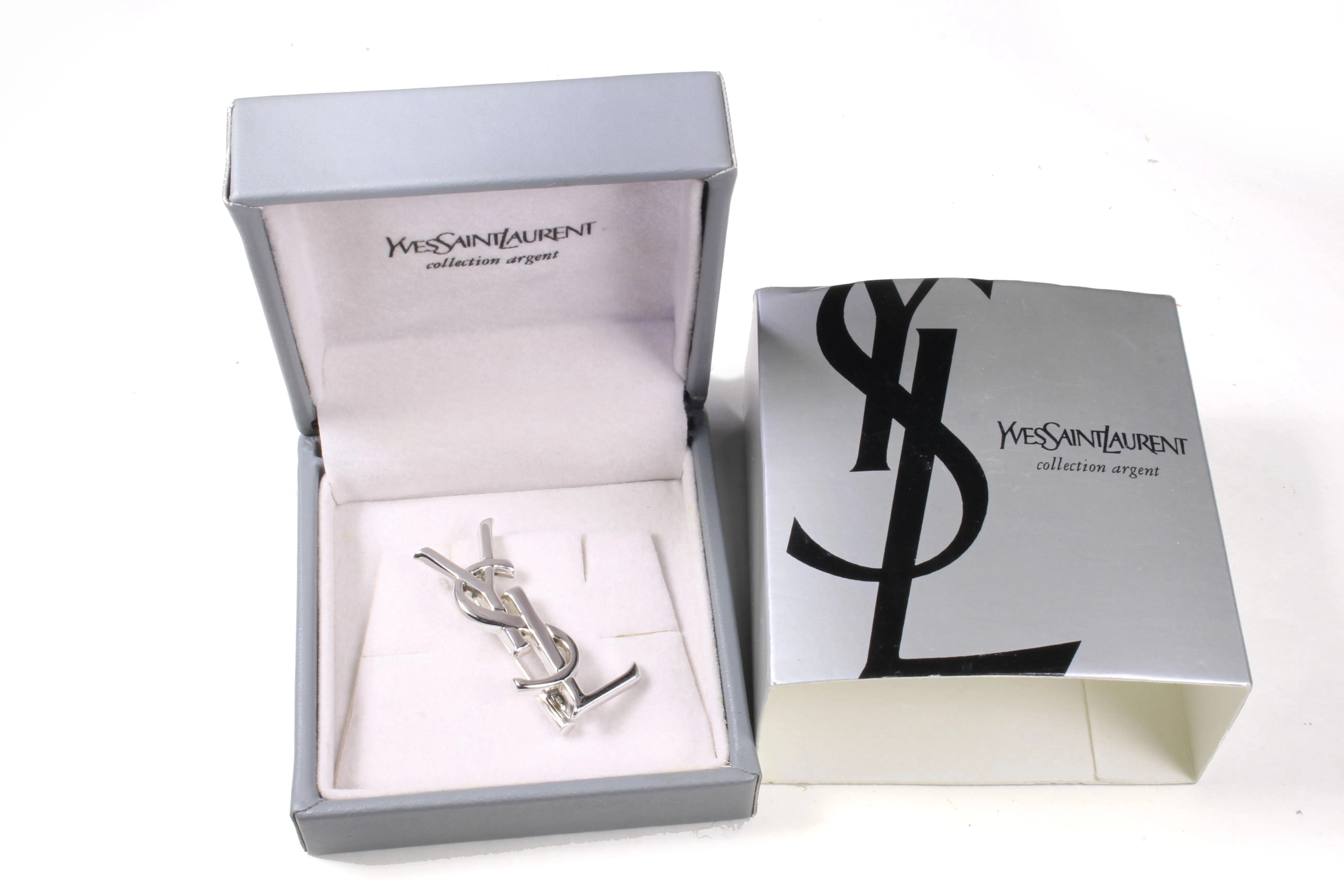 YVES SAINT LAURENT Logo silver brooch